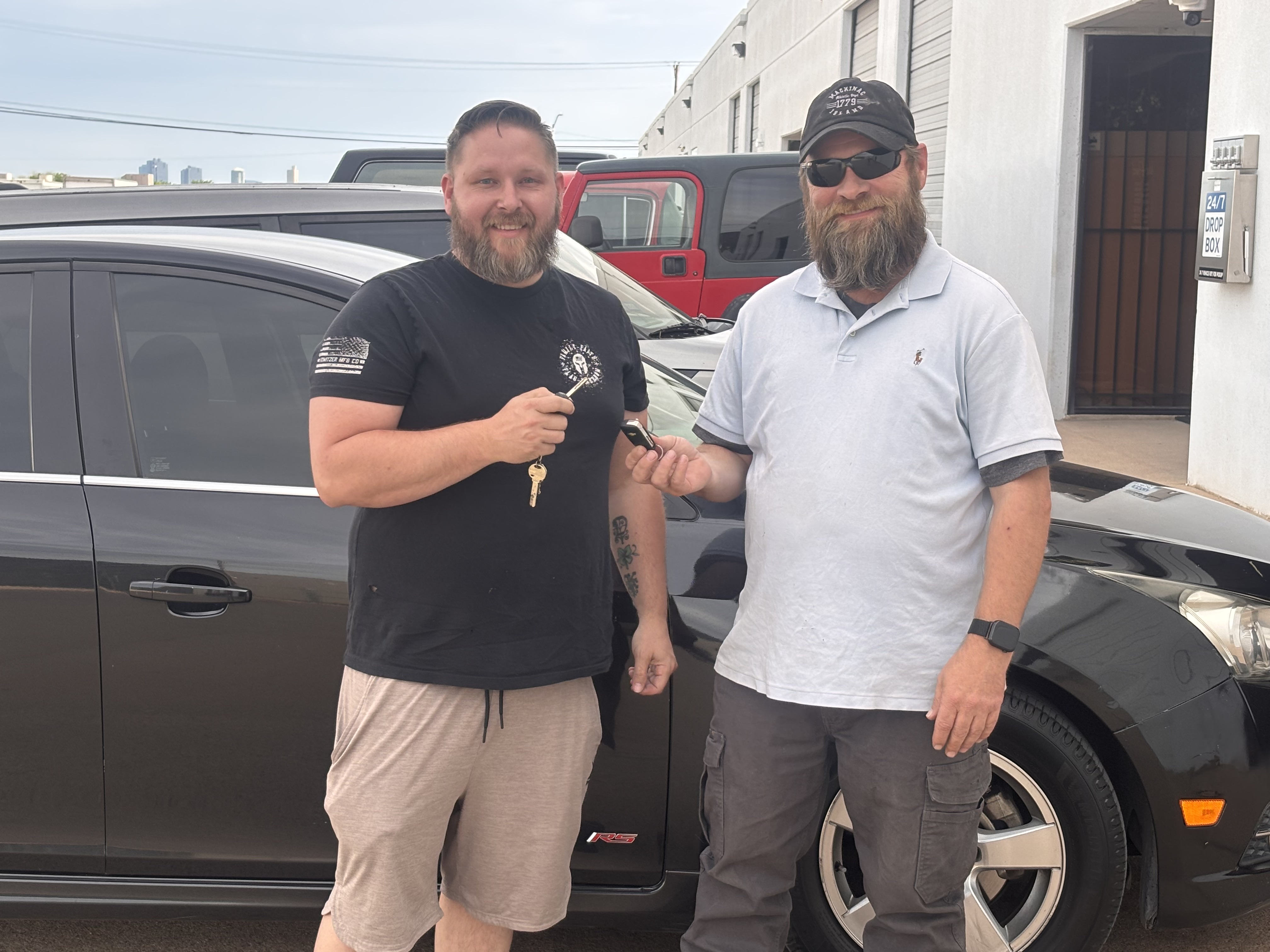 Rex C. taking delivery of his Chevrolet Cruze